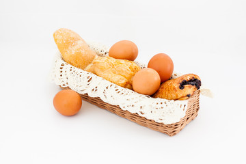 bread in the basket on the white background