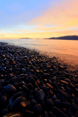 Fototapeta premium .Twilight:An island of smooth polished rocks