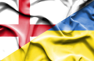 Waving flag of Ukraine and England
