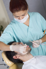 Obraz na płótnie Canvas Dentist Woman Working