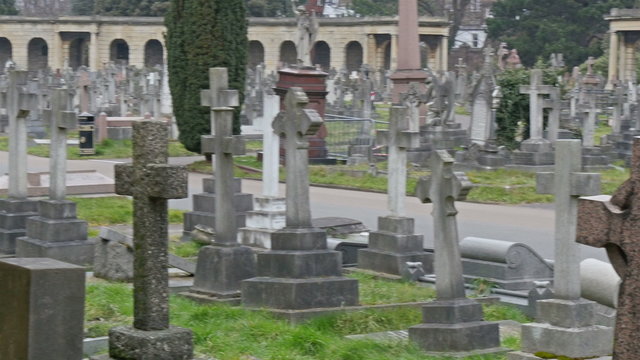 The view of the cemetery with all the gravestones inside. The cemetery is located in London