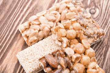 Peanut brittle sweet hard on wooden table