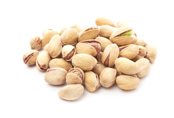 Heap of pistachios nuts isolated on the white
