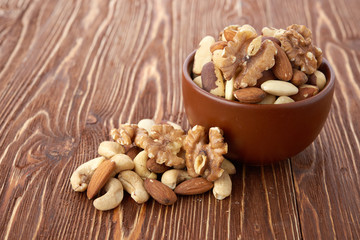 Mix nuts  on wooden background