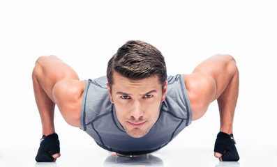 Sports young man doing push ups