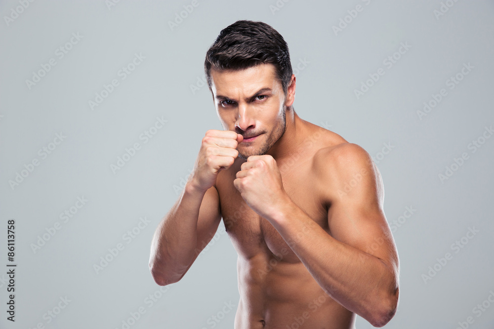 Poster portrait of a muscular male fighter