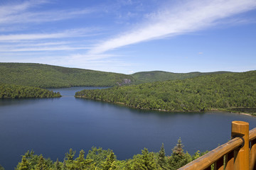 Sacacomie lake in Canada taken from a wooden balcony