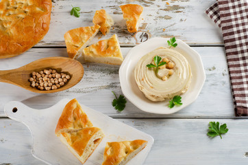 Plate of  a Creamy Hummus with pita.