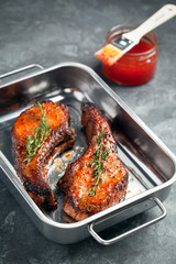 Baked pork with sweet chili sauce, selective focus