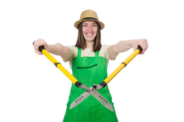 Young woman with shears on white