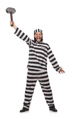 Prison inmate with hammer isolated on white