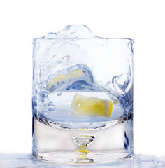 glass of water and a slice of lemon, spray