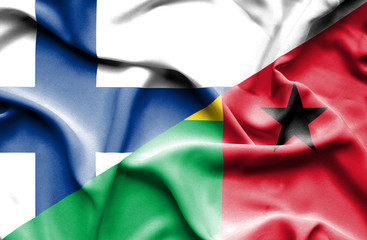 Waving flag of Guinea Bissau and Finland