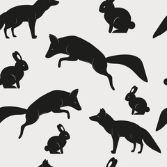 Vector seamless pattern with wild animals foxes and rabbits