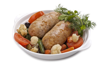 Baked sausage with vegetables  in bowl