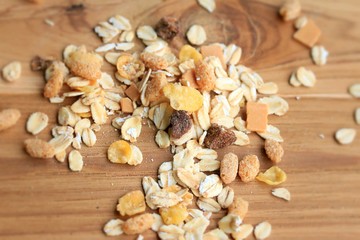 Oat flakes on a wooden background