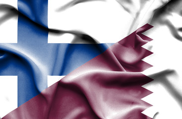 Waving flag of Qatar and Finland