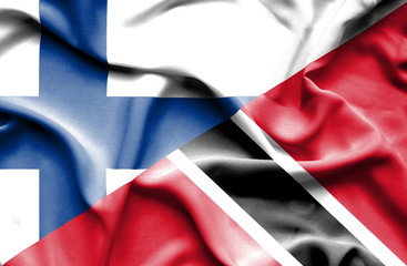 Waving flag of Trinidad and Tobago and Finland