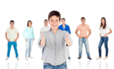 Fototapeta premium Nice teenager boy saying Ok with their classmates