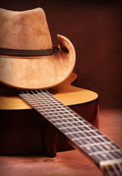 Cowboy hat and guitar for text