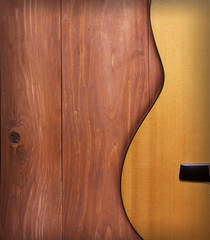 Acoustic guitar and wood background