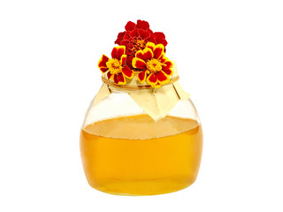 Honey jar and color flowers.