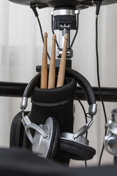 drum sticks and headphones closeup