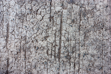Textured walls with dirt.