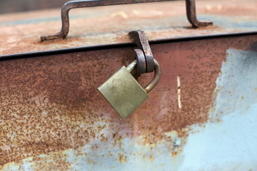 Padlock on metal container