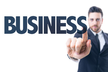 Business man pointing the text: Business