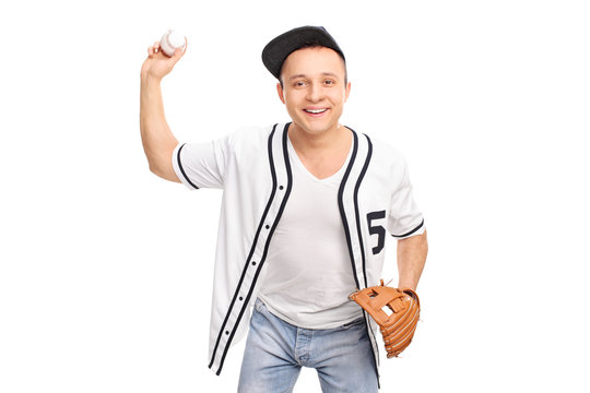 Cheerful Young Man Throwing A Baseball