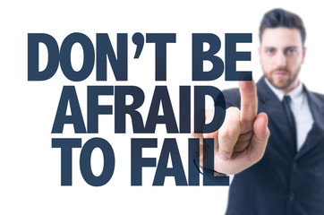 Business man pointing the text: Don't be Afraid to Fail