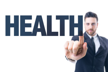 Business man pointing the text: Health