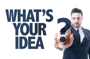 Business man pointing the text: What's Your Idea?