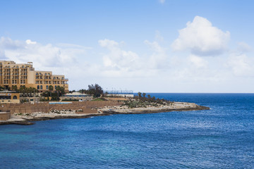 Fototapeta na wymiar Hotels on Maltese coastline