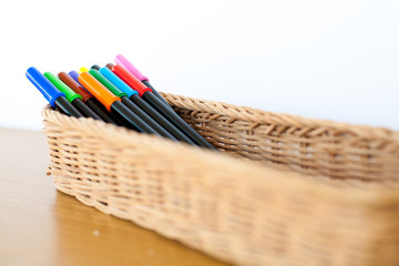 color signing  pens in the basket