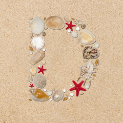 Fototapeta na wymiar D - letter arranged from sea shells and starfishes