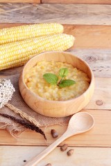 Corn soup of condensed in a wooden bowl