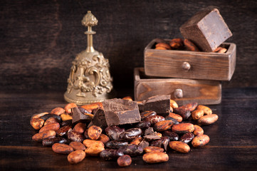 Chocolate and cocoa beans on a dark background