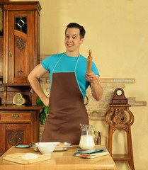 man in the kitchen with rolling pin