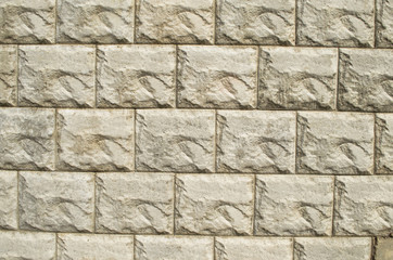 Obraz premium the texture of the stone facade of the building