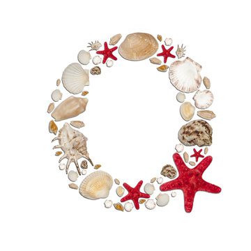 Q -  letter arranged from sea shells and starfishes