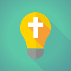 Obraz premium long shadow light bulb with a christian cross