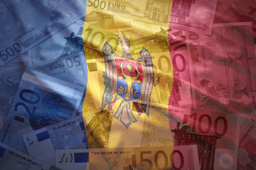 colorful waving moldavian flag on a euro money background