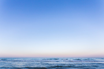 Fototapeta premium Sunset sunrise on the sea with beautiful waves