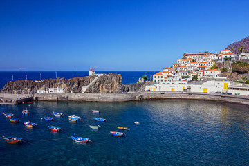 Fototapeta na wymiar Madeira, Portugal, boats in fishing village Camara de Lobos