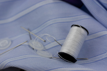 Fototapeta na wymiar Sewing cotton needle and pins