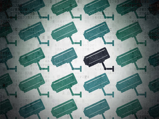 Security concept: cctv camera icon on Digital Paper background