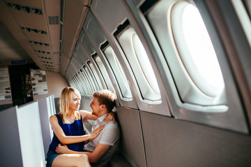 Young couple on board the aircraft