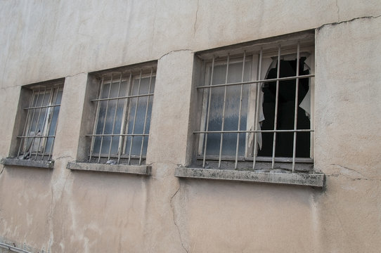 window broken at an industrial building facade